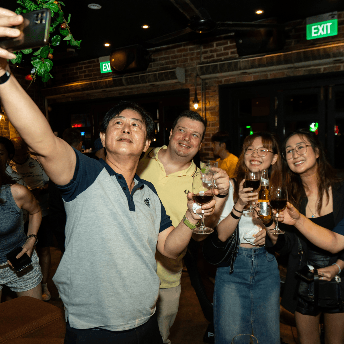 Agile team taking a selfie over drinks
